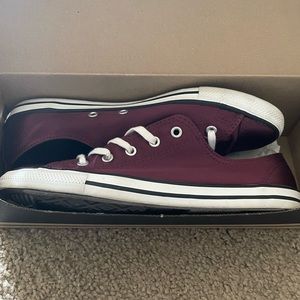 Burgundy converse shoes with original box. Worn one time.. basically new.